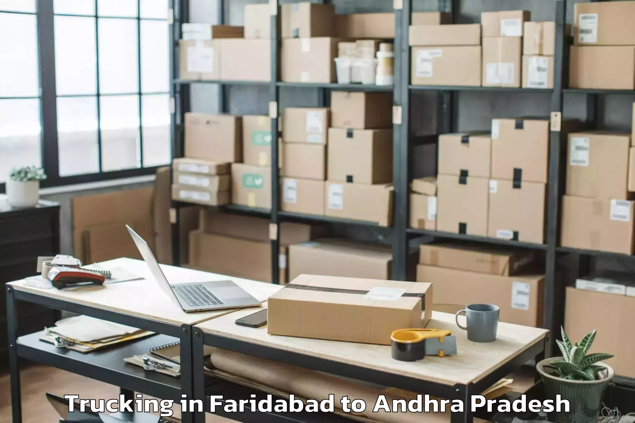 Book Faridabad to Komarolu Trucking